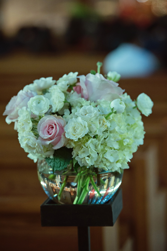 Elegant white and pink flower arrangement in glass vase