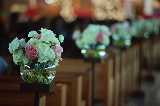 Rose and hydrangea floral arrangement in glass vase