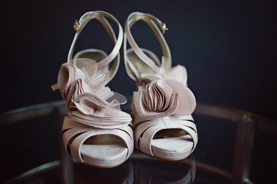 Elegant floral wedding heels in nude color closeup