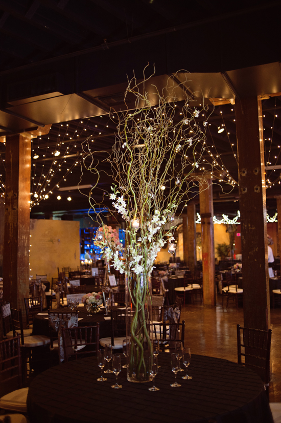 Wedding reception hall with floral centerpiece table