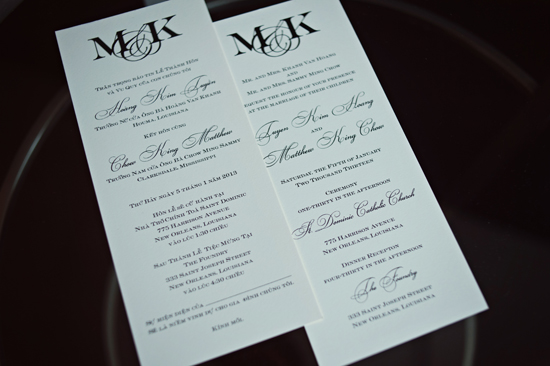 Elegant wedding invitations with MK monogram detail