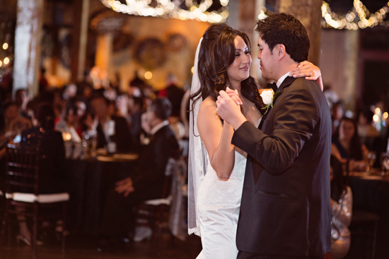 Bride and groom sharing first dance at wedding party