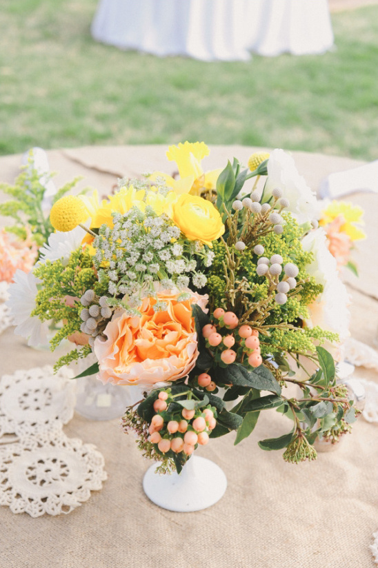 yellow and peach floral centerpiece