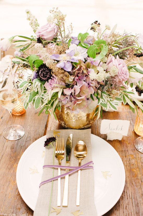 Elegant wedding table setting with floral centerpiece