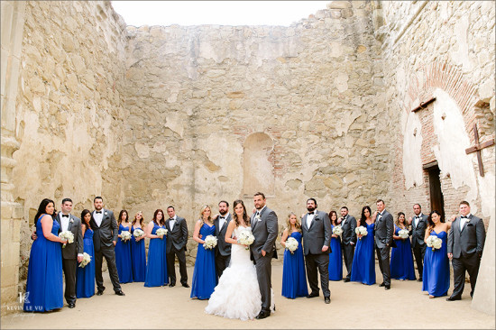 Bridal party at historic stone wall venue