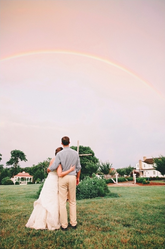 rainy day wedding with rainbow ending
