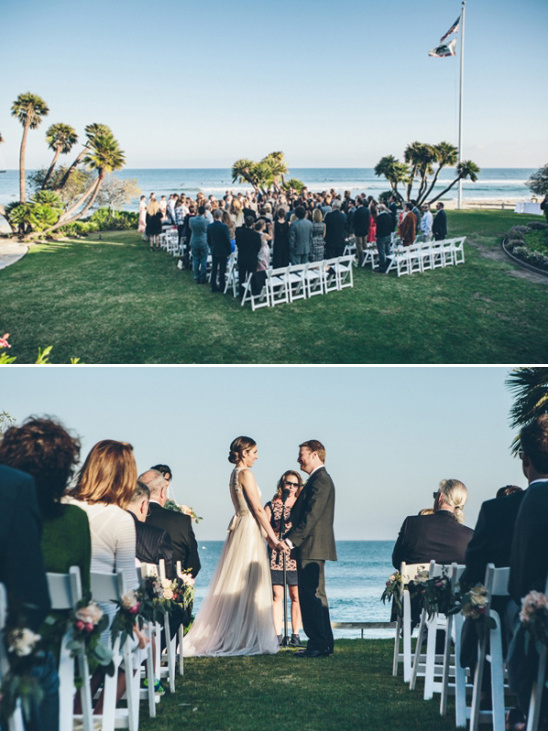 Scenic ocean wedding ceremony with bride and groom