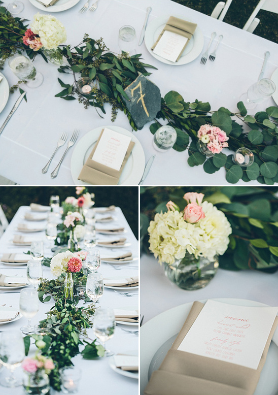 Rustic wedding table setting with floral garland decor
