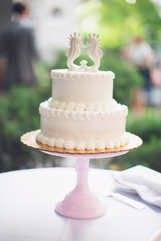 seahorse topped wedding cake