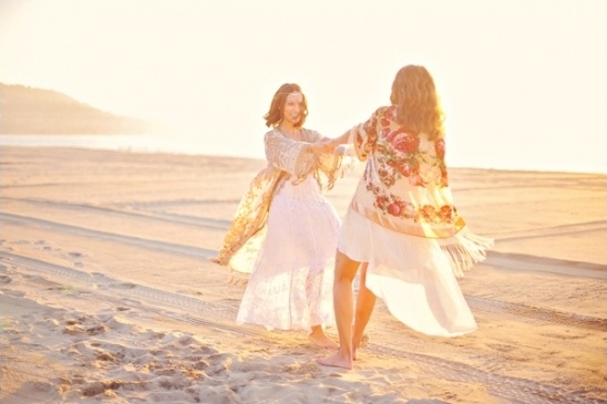 bride and bridesmaid twirling in kimonos