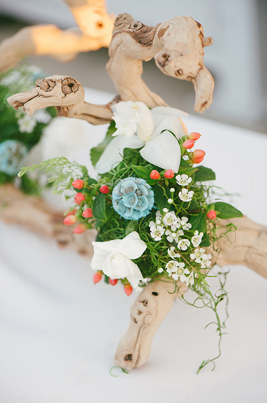 wood and floral centerpieces