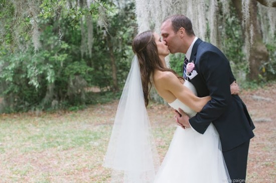 Bride and groom sharing a kiss on their wedding day
