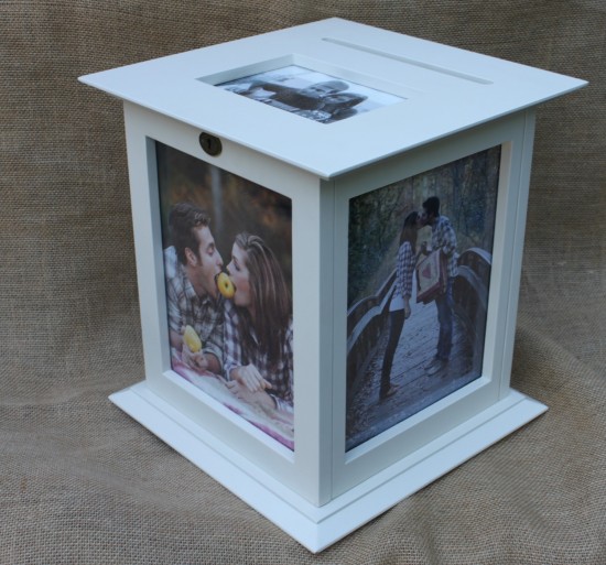 White wooden photo box with couple pictures
