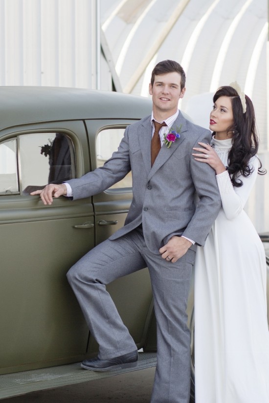 Vintage wedding couple with classic car portrait