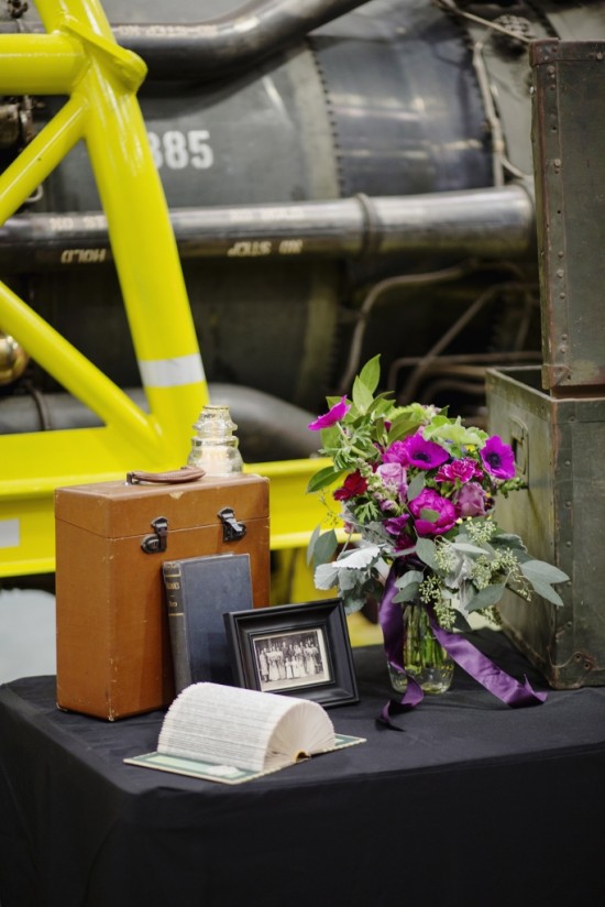 Vintage floral arrangement with books and photo frame