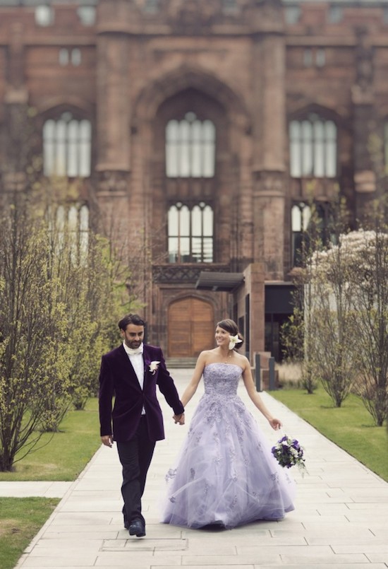 Bride and groom walk hand in hand after a stunning wedding ceremony