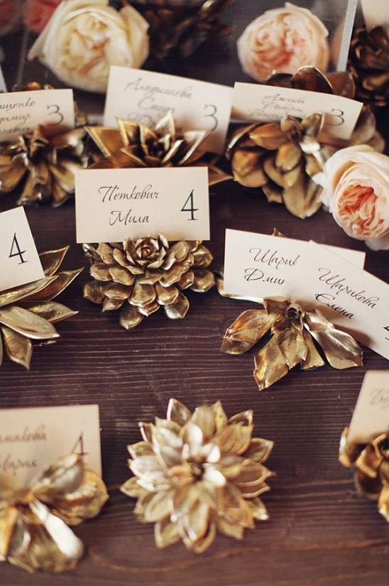 gold painted succulent escort card holders