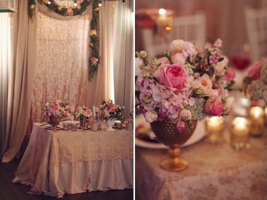gold and pink sweetheart table with glittery backdrop