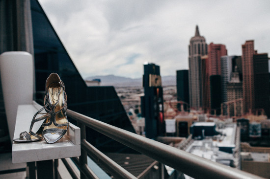 Elegant bridal shoes with Las Vegas skyline in background