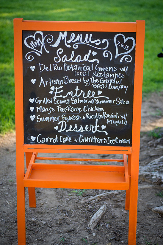 bright orange chalkboard menu