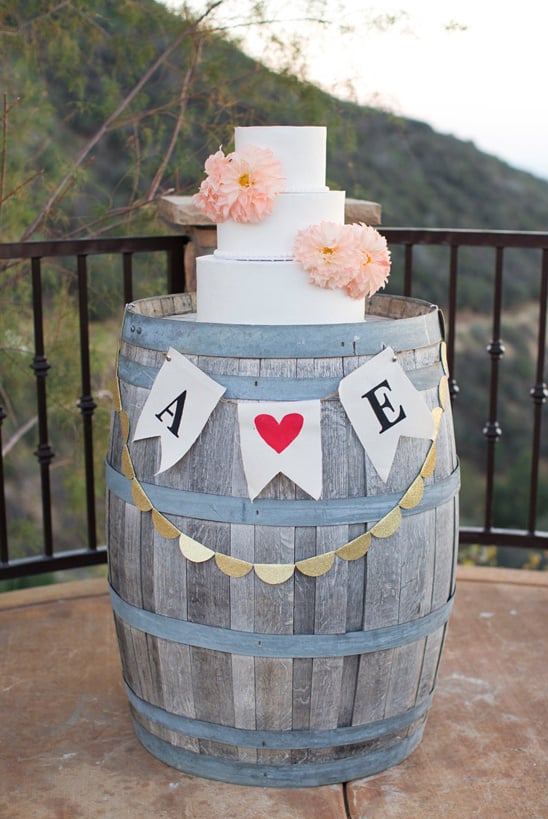 use a wine barrel as a wedding cake stand