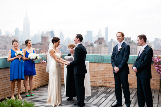 Wedding ceremony with NYC skyline in the background