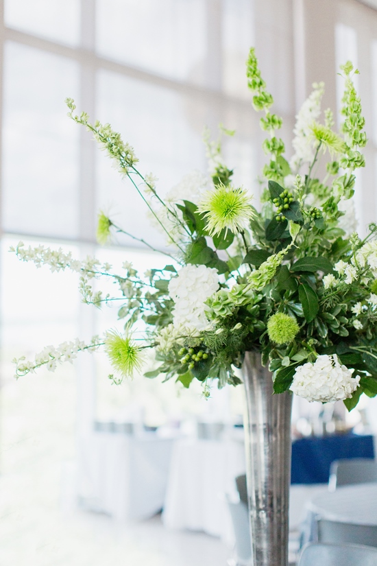 Elegant floral arrangement with white and green flowers in a vase
