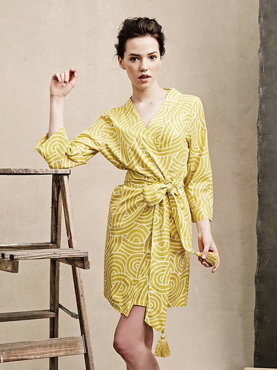 Woman in a yellow robe with a unique pattern