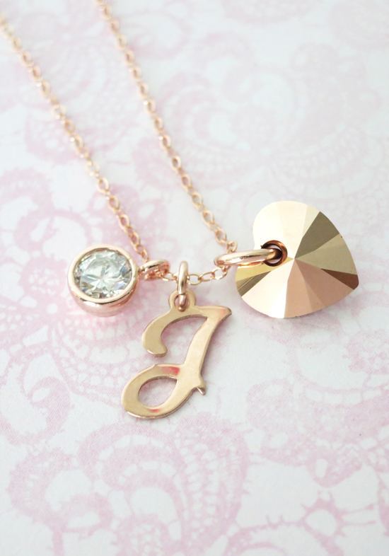 Rose gold personalized initial J necklace with a heart charm