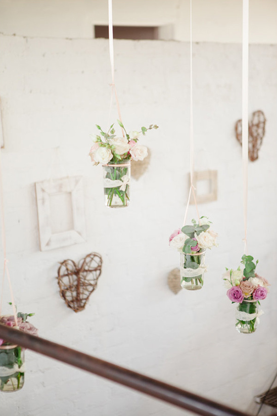 hanging floral and photo frame backdrop