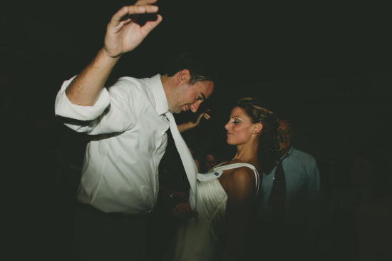 Bride and groom dancing together at their wedding reception