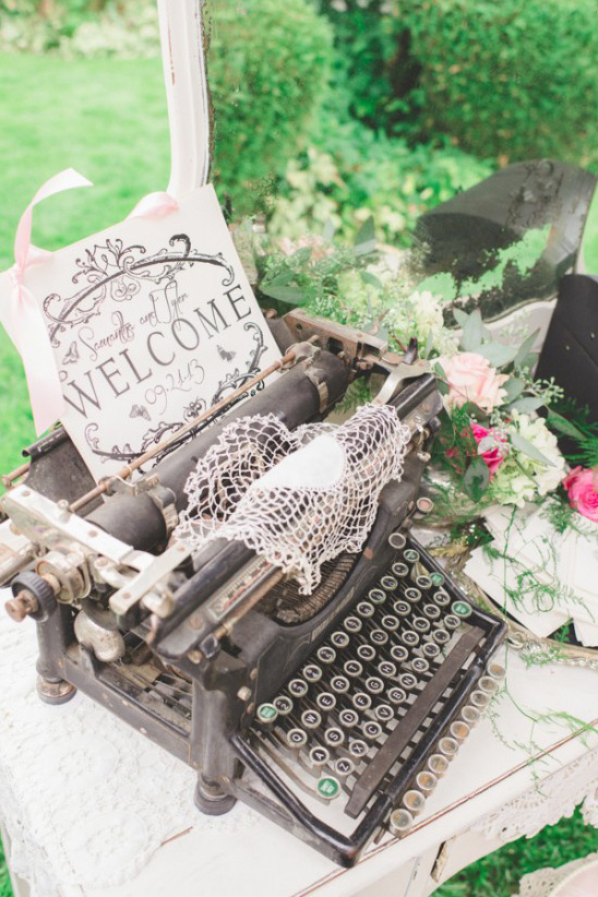 Vintage typewriter decor with welcome sign at wedding