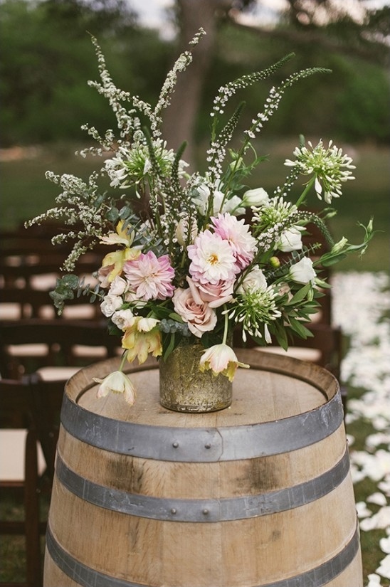 gorgeous aisle floral decor on barrel