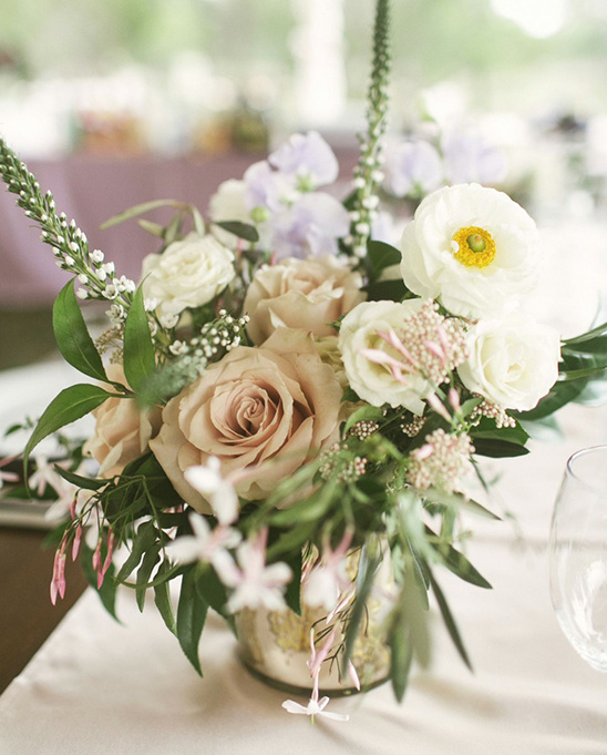 mercury vases with floral arrangements