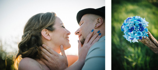 Happy couple embracing with blue flower bouquet on their wedding day