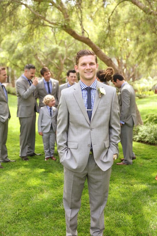 grey suit with blue checkered shirt groom look