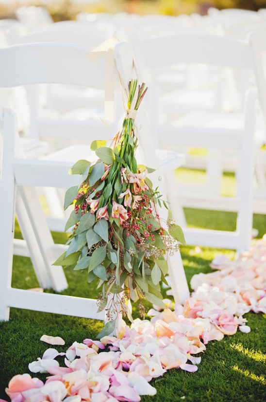 rose petals and hanging floral aisle decor