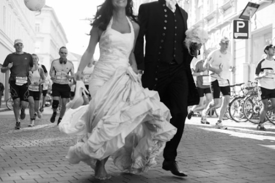 Bride and groom join marathon runners in black and white