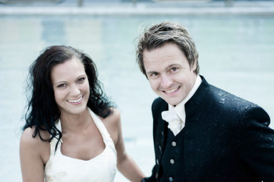 Happy couple smiling on their wedding day