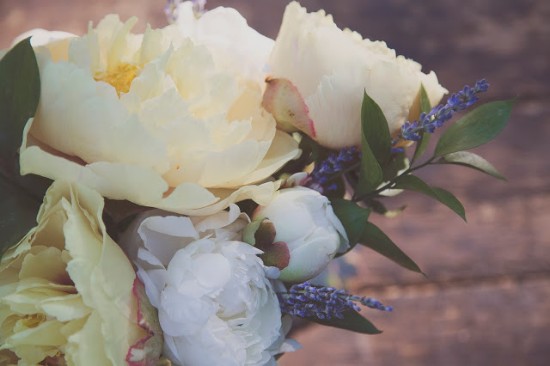 A beautiful bouquet of white peonies and lavender flowers