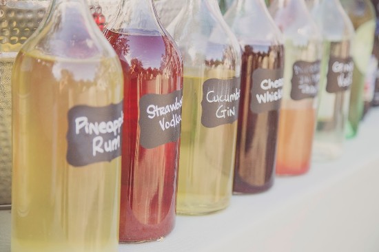 Bottles of colorful cocktails, perfect for a summer party