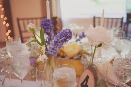 Elegant wedding table setting with flowers and glassware
