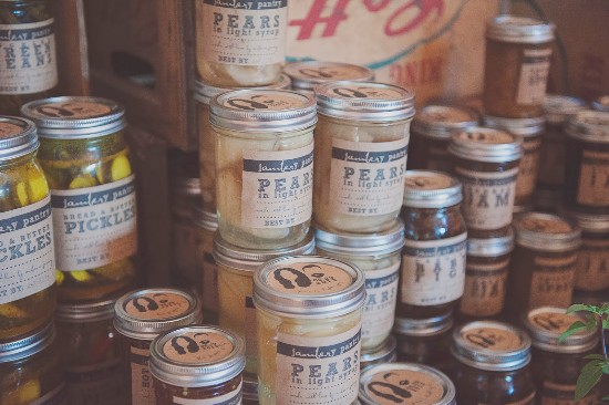 Vintage jars of pears and pickles in light syrup for sale