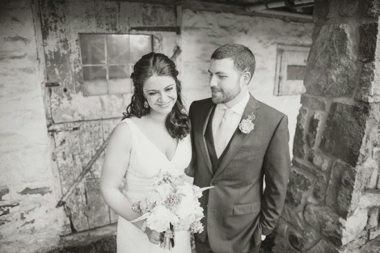 Bride and groom smiling on their wedding day portrait