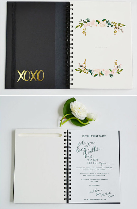 Black planner with floral design and gold XOXO, perfect for planning