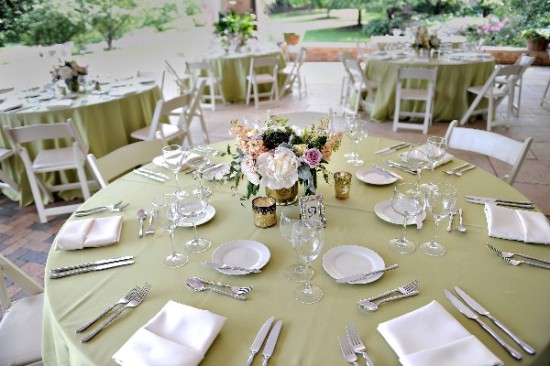 Elegant outdoor wedding reception table setting with floral decor