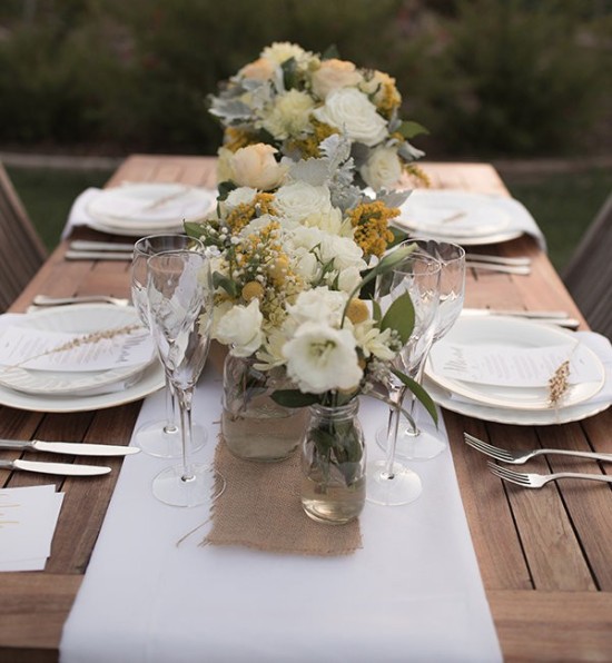 Elegant wedding table setting with floral centerpiece