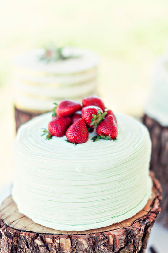 strawberry topped green wedding cake