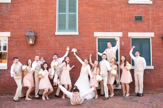 Happy wedding party celebrating joyful event together