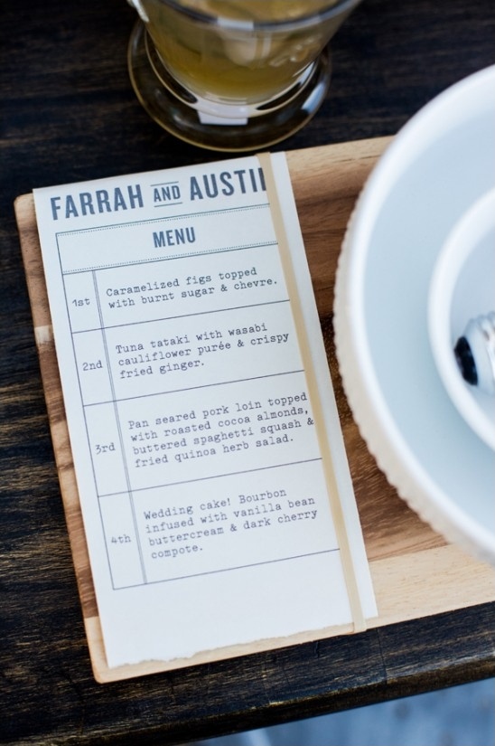 wooden plank placemats with rubberbanded menu attached